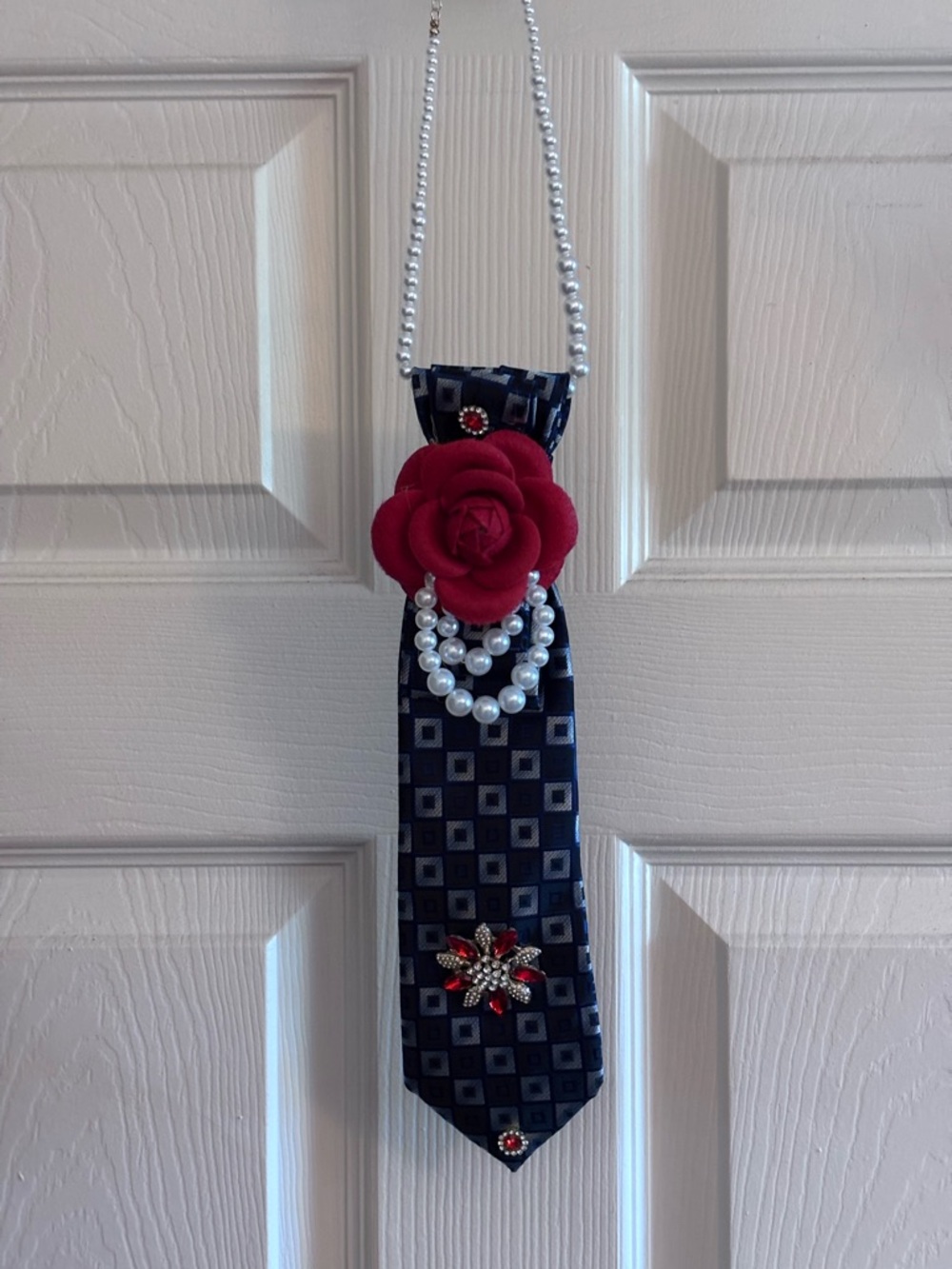 Navy Blue Patterned Tie Necklace with Red Flower and Pearl Accents - Picture 2 of 5